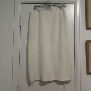 white sip up skirt,cute to pair with a blazer and a button up!